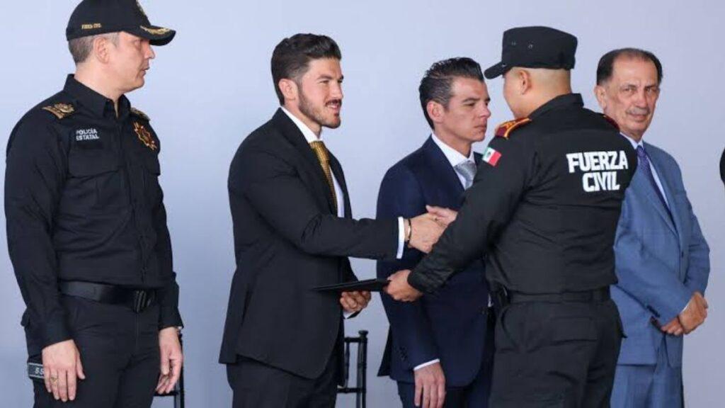 Men in Formal Suits Shake Hands with a Uniformed Officer Labeled 'fuerza Civil' During a Formal Ceremony, - Vecinos Unidos
